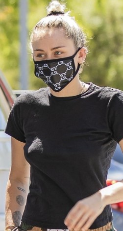 Beverly Hills Miley Cyrus wearing Gucci Face mask